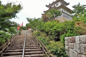Visitors must climb a lengthy staircase to reach the castle