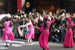 Dancers making their way through Yokohama Chinatown