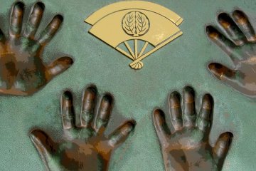 Handprints of Sumo wrestlers who visited the island