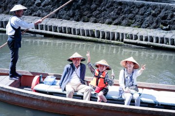 Happy visitors on the Uzawa River