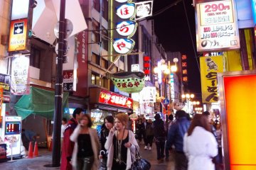 <p>Neon signs turns night into day on the Sidewalks around Dotonbori in Osaka&#39;s Naniwa district</p>