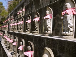 Mizuko Jizo statues apparently also help protect the innocent souls of children in the afterlife