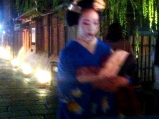 Was she a geisha that walked past? A fleeting moment of night beauty at Gion Shirakawa in Springtime