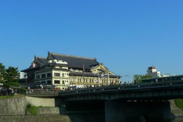 View of Minamiza Kabuki theater from the Kamo River.