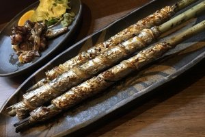 Tachimaki is scabbardfish wound around bamboo and barbecued. Enjoy it; you won't find this anywhere else on the planet.