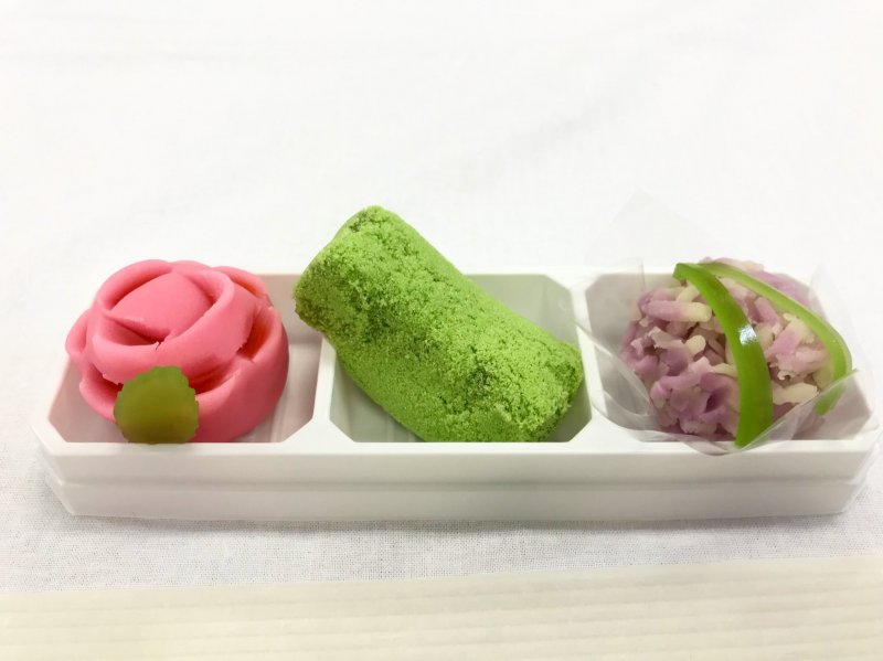 Seasonal rose and hydrangea wagashi, with a mossy stone in the middle!