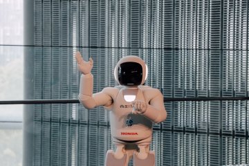 ASIMO gives a demonstration which includes singing!