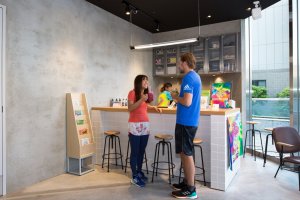 Sunshine Juice bar offers cold pressed juices and smoothies with optional vegan protein boosts.
