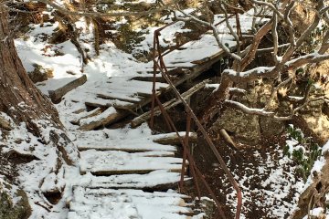 Snowy wood stairs