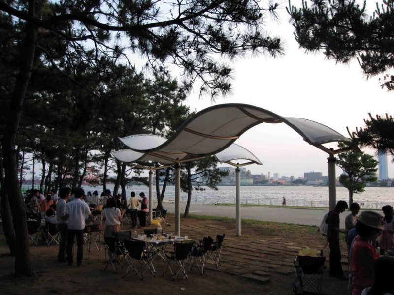 Gather with friends and enjoy waterfront views in Shiokaze Park.