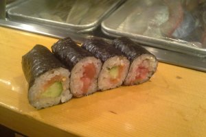 Handmade rolled sushi with tuna and cucumber.