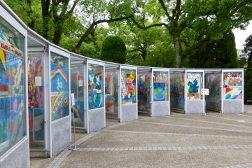 There are nine 'booths' surrounding the statue, each one housing thousands of paper cranes