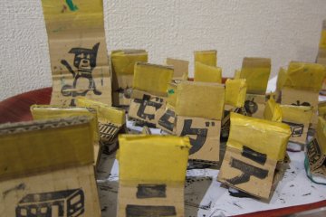 Recycled Paper stamps with recycled cardboard as its handle