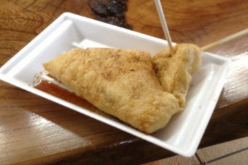 One store produces and sells nothing but deep fried tofu. It taste great coming right from the fryer!!