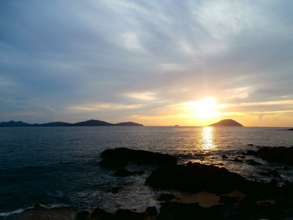 The setting sun seen from the island