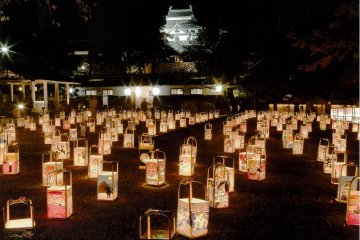 Hundreds of hand-made paper lanterns are laid in and around the castle grounds for Matsue Suitoro