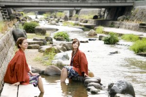 Enjoy free hot spring foot baths by the river