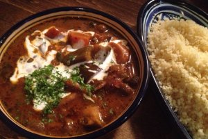 Spicy curry with eggplant and couscous