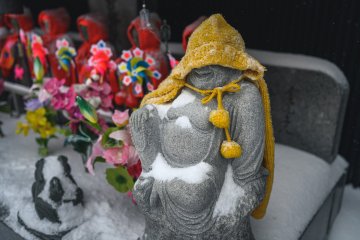 A snow covered statue in Aomori City