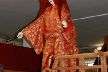 A wide range of colorful animated dolls are on display
