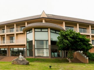 The building sits prominently on the coast line in a secluded stretch of Nishinoshima&#39;s coastline.