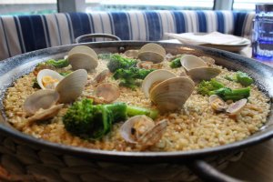 Another one topped with sweet broccoli and clams