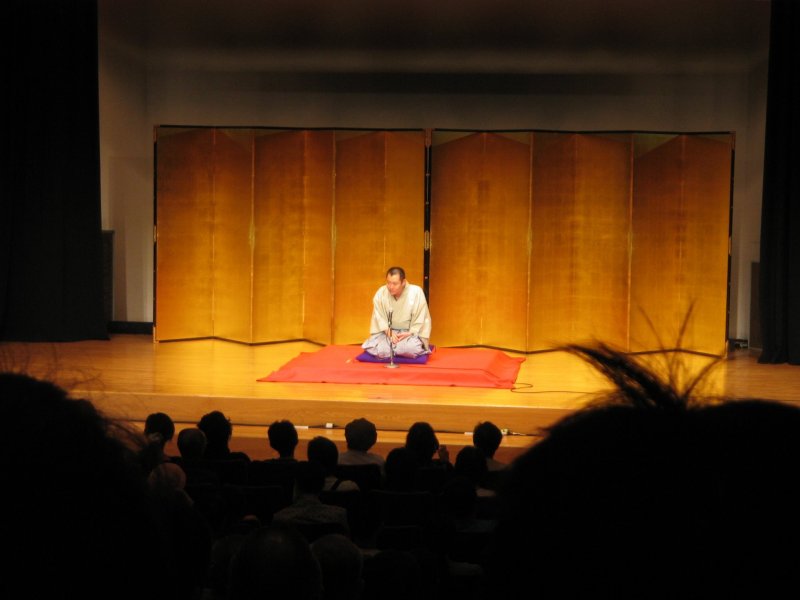 A rakugo performer entertaining his audience