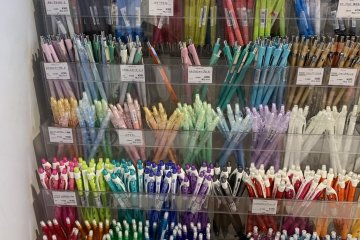 Pens of different colors and point sizes