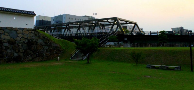From the right side of the park, lies the Maizuro Bridge, and across the bridge is the station.