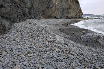 A rocky beach after the last tunnel