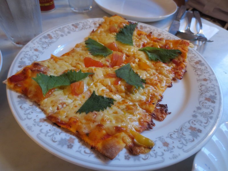Sundried tomato and basil mozarella cheese pizza