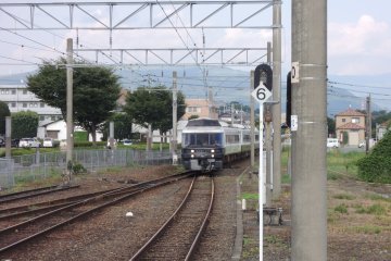 The deluxe Aso Boy train coming into the station