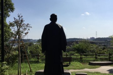 Kano Jigoro statue overlooking Teganuma and gazing on Mount Fuji