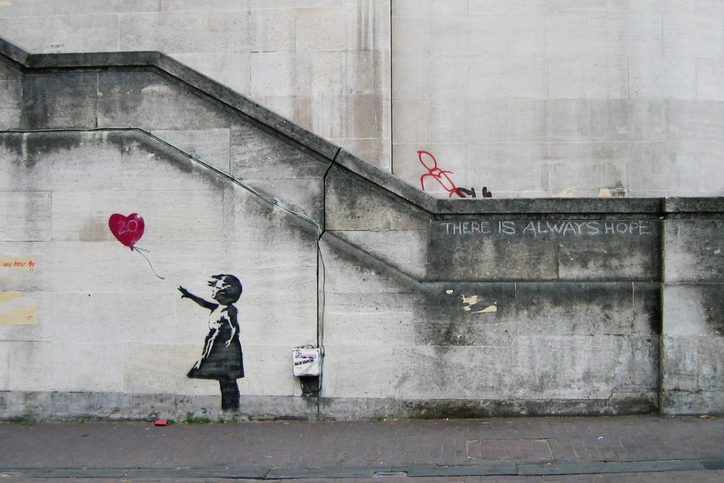 One of Banksy\'s iconic street art pieces