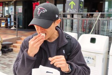 Hiro eating black egg at Owakudani 