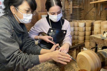 Wood carving with an apprentice