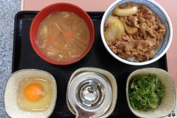 <p>Gyunegitamadon is the beef gyudon with egg and green onions shown here with a side order of tonjiru soup, a miso-base soup with vegetables and pork</p>