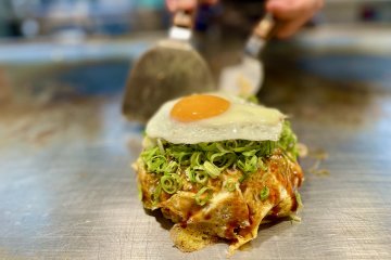 Freshly prepared okonomiyaki