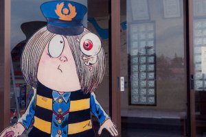 The anime's main character (Kitaro) dressed up as a station attendant.