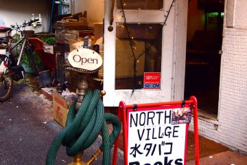 <p>The sign of North Village Books &amp; Shisha shouldn&#39;t be hard to spot given the huge hookah pipe beside it.</p>