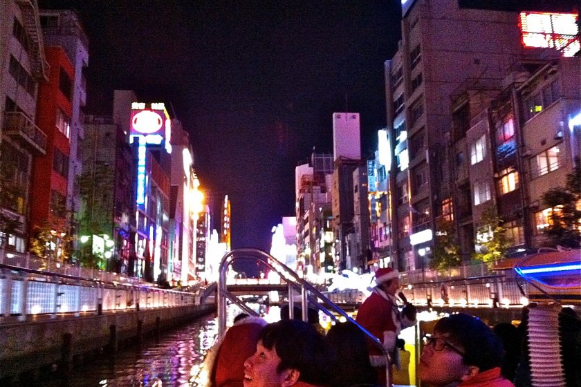 A few of the Tombori River Cruise passengers in awe of the neon lights