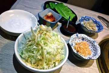 Vegetable Set ¥700 that comes with lettuce, cabbage salad, kimchi, peppered bean sprouts & pickled vegetable