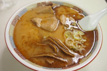 The thick and creamy soup of Hachiya's ramen has a slight burnt taste. The noodles are thin and the pork has a tough bite