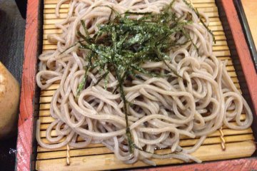 <p>The cold soba is dipped into the accompanying sauce one chopstick full at a time</p>