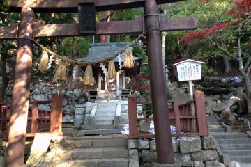 Several small shrines dot Kinkasan Island. Pray hard and you may one day become rich.