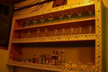 selection of glasses on a DIY cupboard
