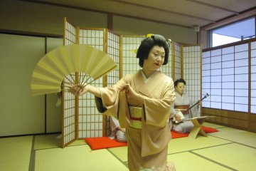 Awara Geisha, Ms. Shiori, dancing gracefully with open fan