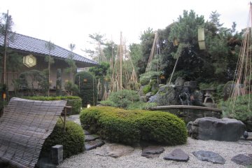 Japanese garden. Yukitsuri is already in place to protect trees from heavy snow