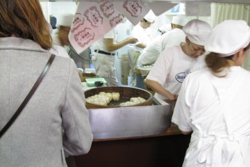 <p>More chefs at work inside the store at Rosyoki</p>