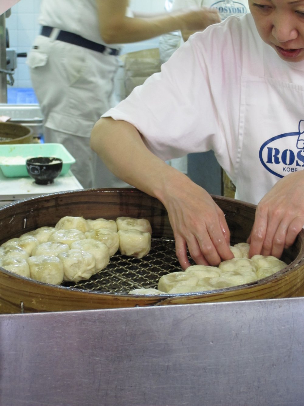 The chefs at work, preparing delcious nikuman (steamed bun with meat filling)